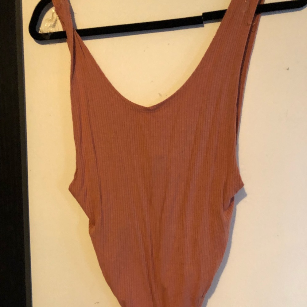 Pink body suit